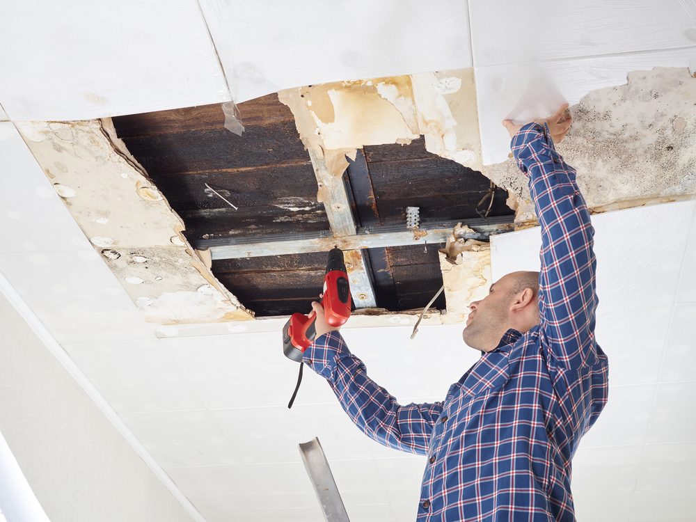 Moisture control work on water damaged ceiling