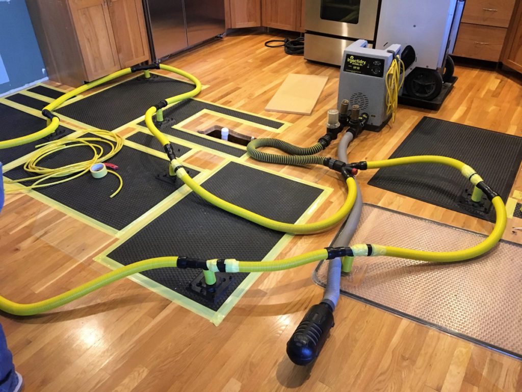 Flood cleanup with water extraction equipment